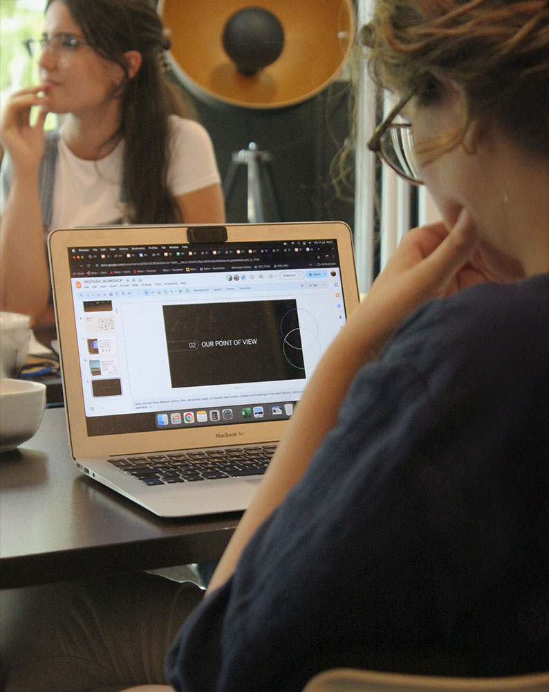 CrisPC Woman focused working on her laptop